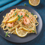Spicy garlic butter pasta with lemon, herbs with chicken and shrimp